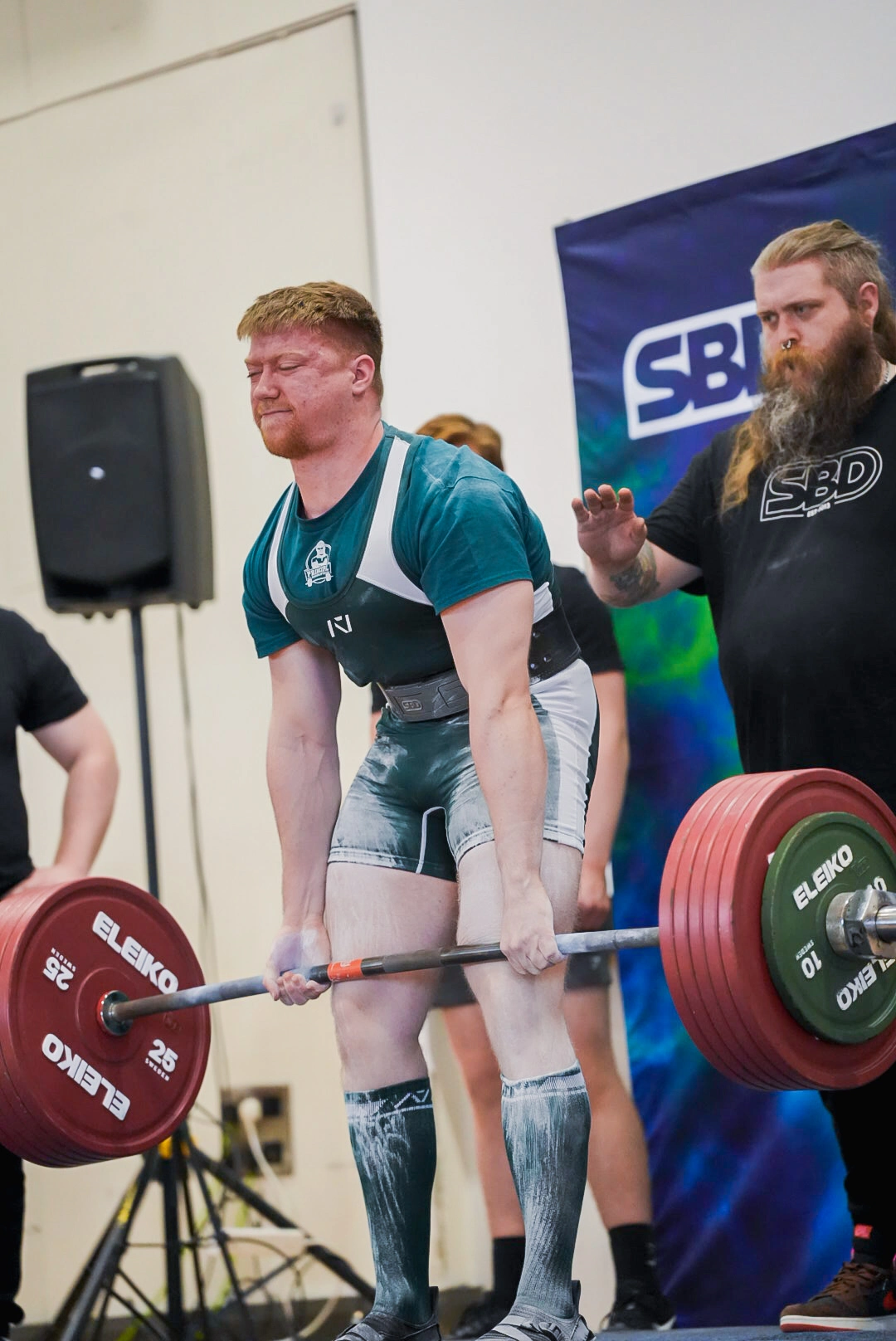 295 kg